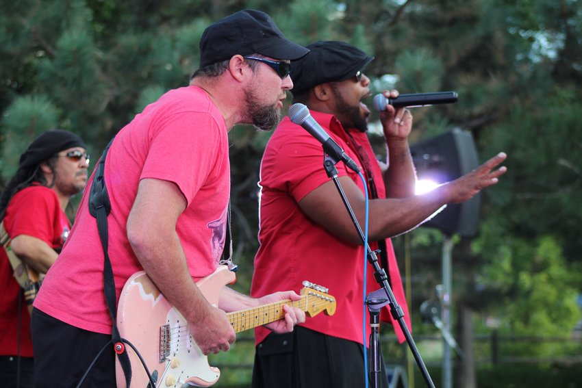 Little Moses Jones performs at the summertime Movies & Music in the Park event Aug. 12 at Parfet Park. The band performed a mix of 90s R&B, soul and funk songs before a screening of "The Princess Bride."